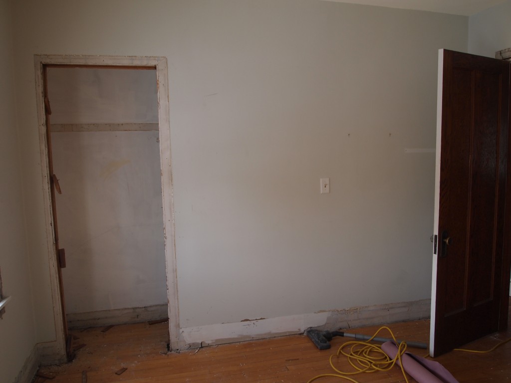 Baseboards, door and window trim removed
