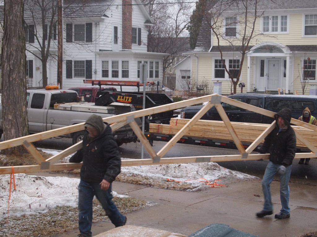 Greg and Matt unloading the trusses