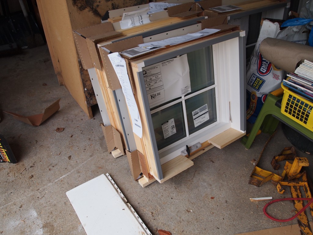 One of three small bedroom windows