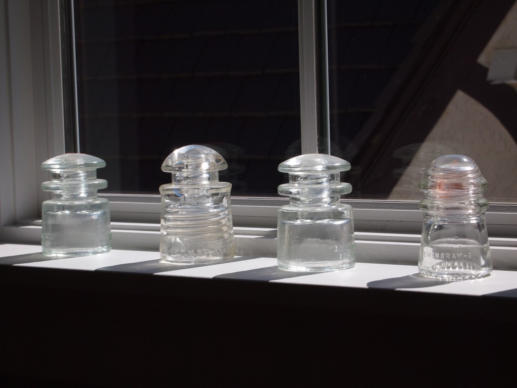 Electrical insulators on the bedroom windowsill.