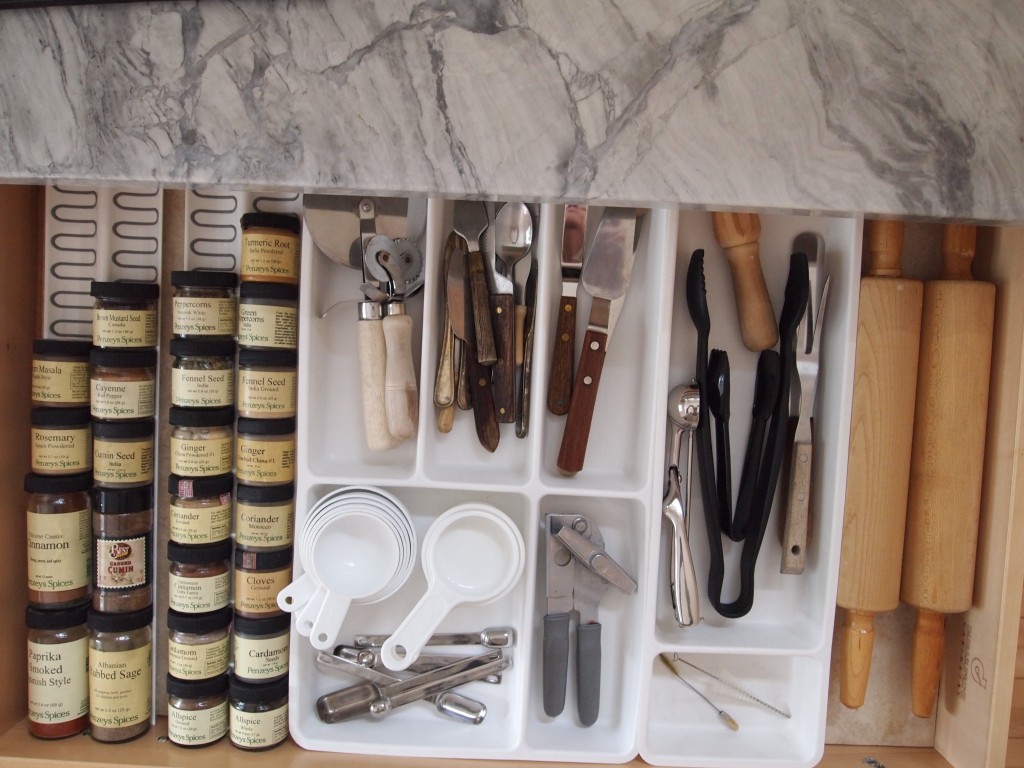Top drawer on the left has spices and other small items.